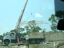 new house frame going up 5-10-05.jpg